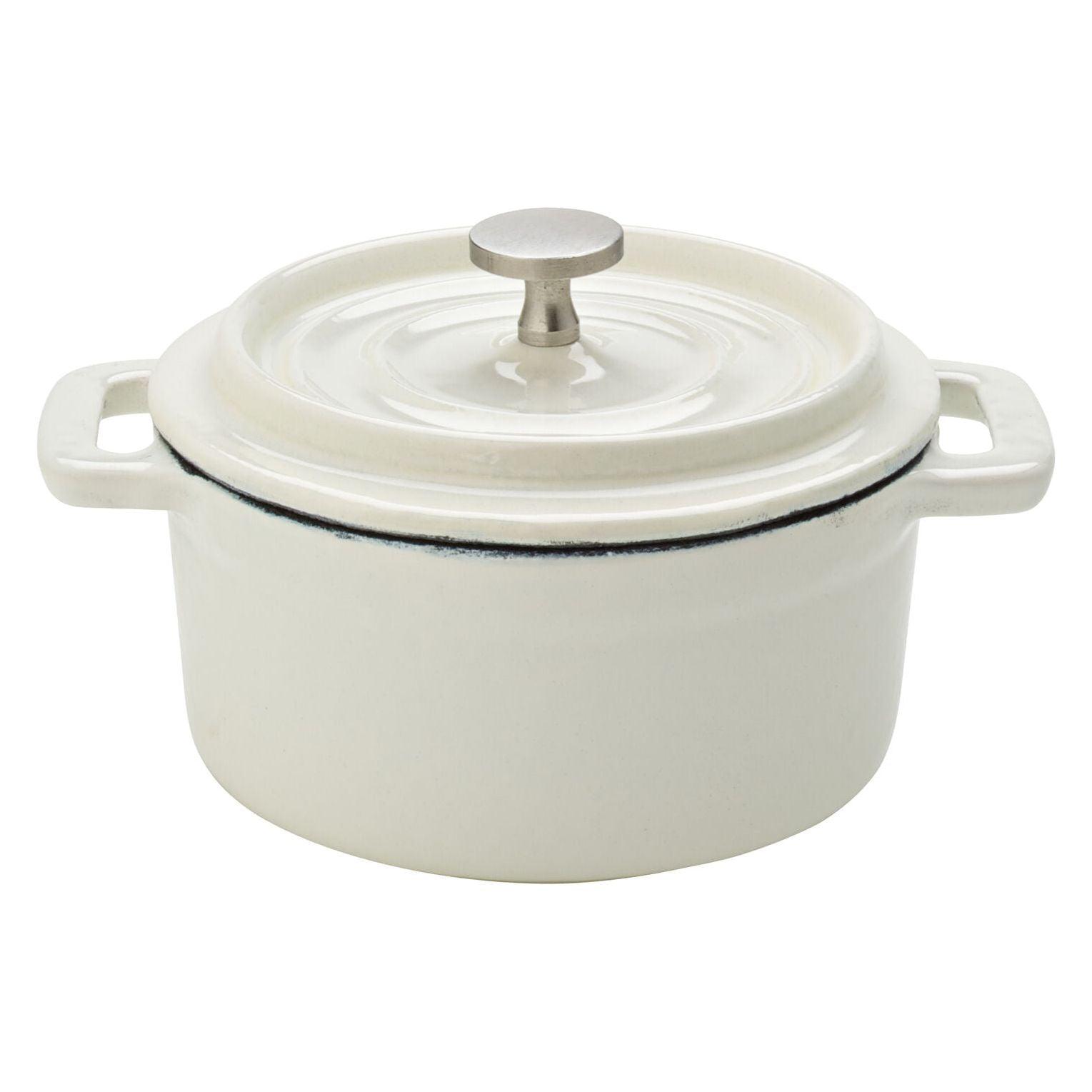 A white enamel pot with a lid on a white background.