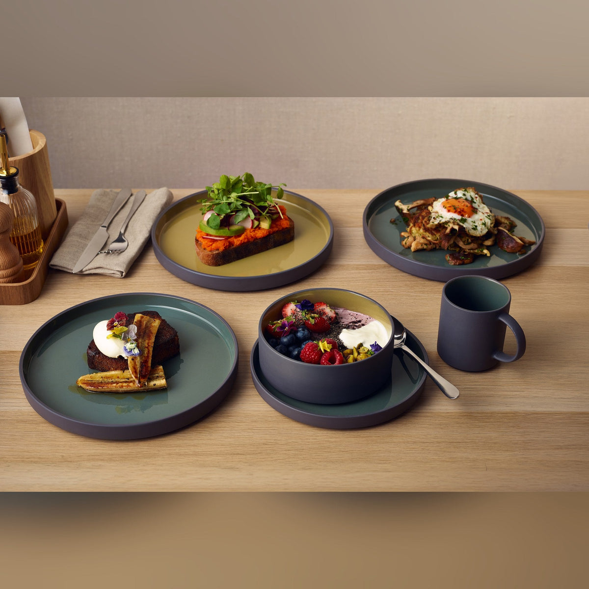 Kava green porcelain presentation plate 25cm with unglazed wall, lifestyle image