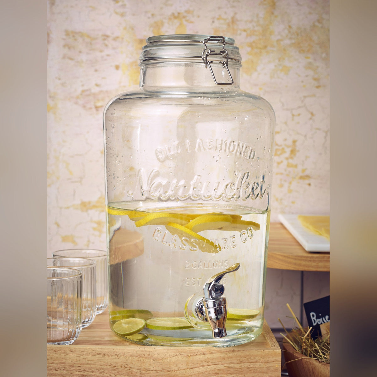 Nantucket glass drink dispenser 7.6L with tap and metal stand, lifestyle image