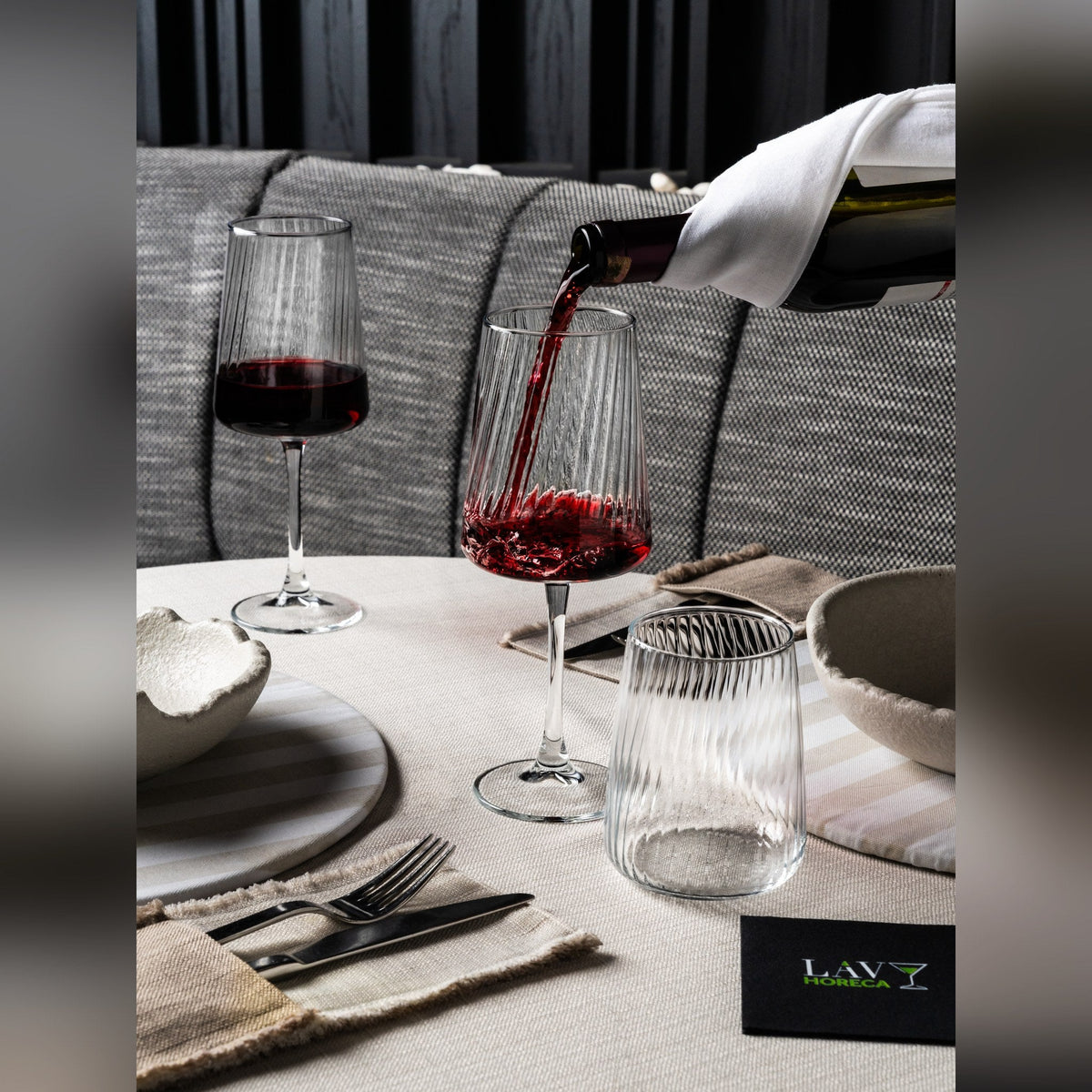 Modena optic crystal-look glass wine glass 58cl with vertical striations, lifestyle image