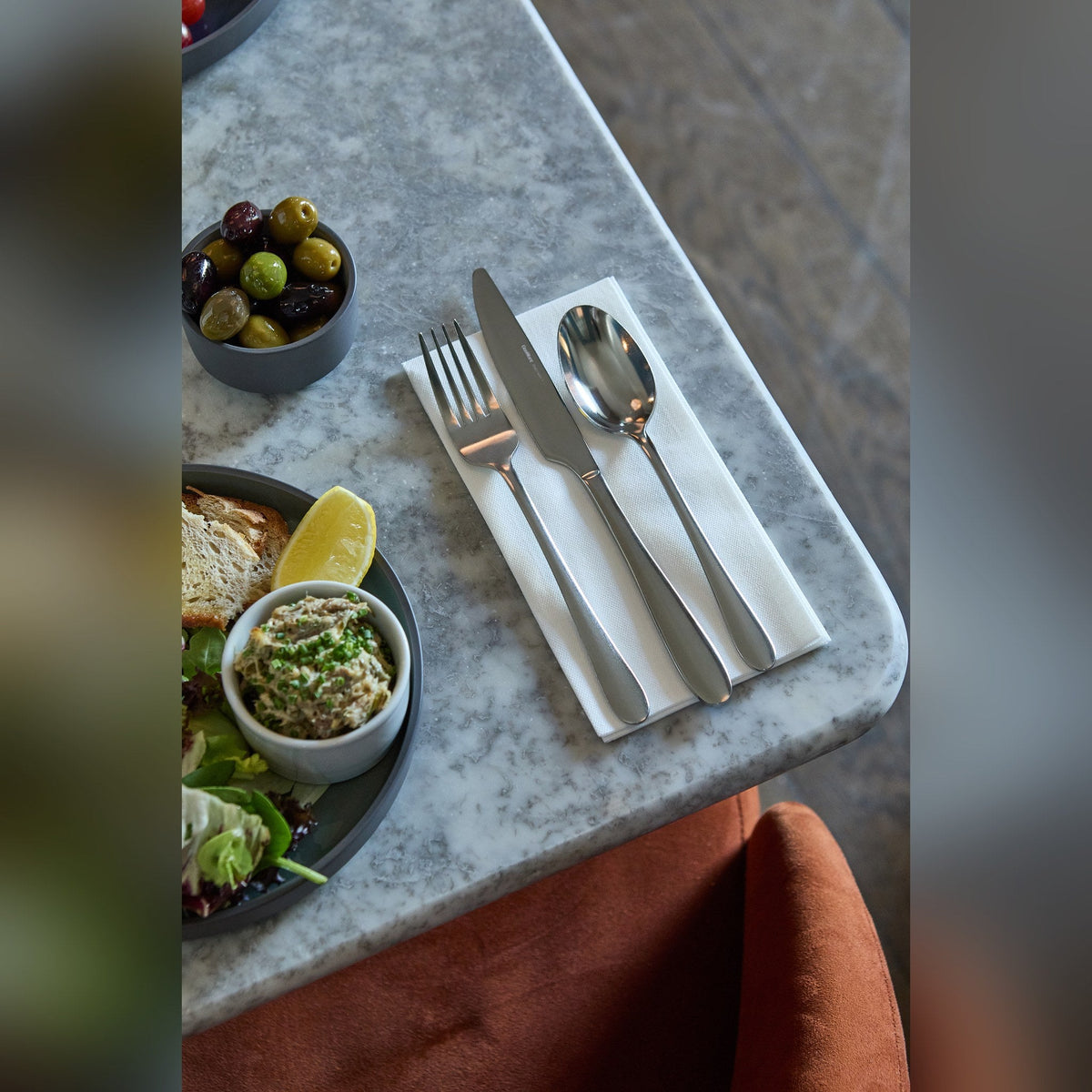 Massa polished stainless steel table fork, lifestyle image