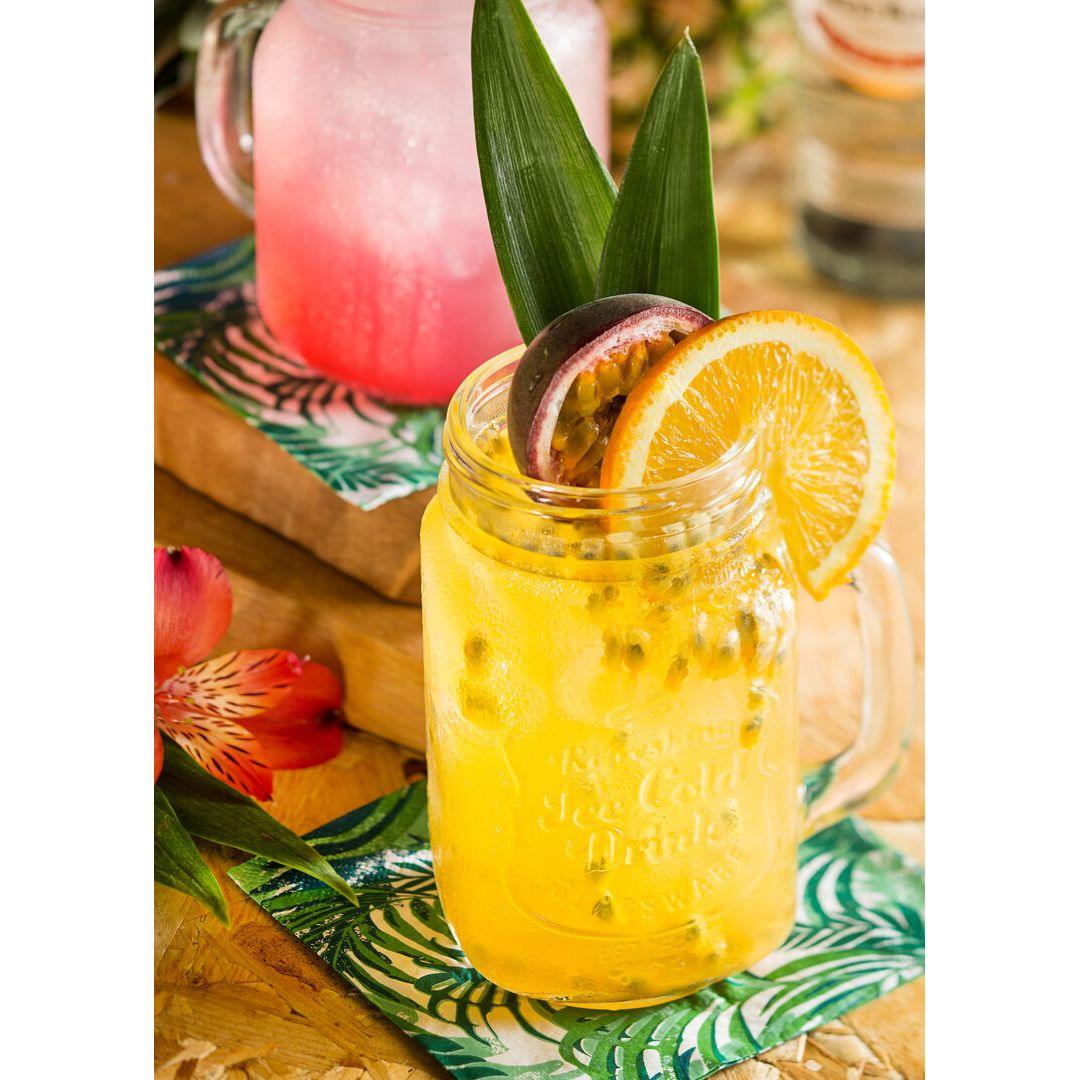A visually stunning Alabama Handled Drinks Jar cocktail, perfect for tropical drink lovers, brought to you by Utopia.